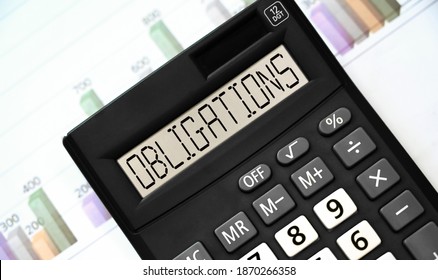 OBLIGATIONS word on calculator. Business and financial concept - Shutterstock ID 1870266358