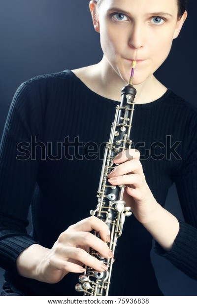 old lady playing oboe artclip