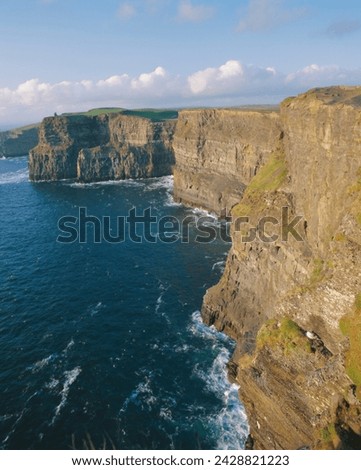 O'brian's tower and breanan mor seastack looking from hag's head, the cliffs of moher (230m cliffs), county clare, munster, republic of ireland (eire), europe