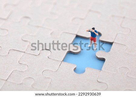 Observation from afar at the blank space of the miniature photography puzzle