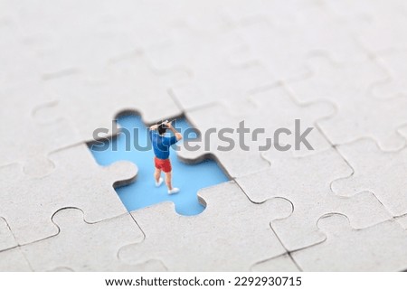 Observation from afar at the blank space of the miniature photography puzzle