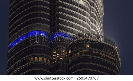 The observation deck on a balcony of the highest building in the world timelapse. Burj Khalifa at twilight close up view. United Arab Emirates