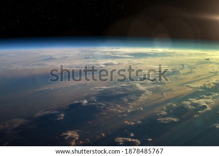 Observation of the planet Earth from space. On the surface of the planet are visible clouds. Earth's atmosphere. Elements of this image furnished by NASA.
