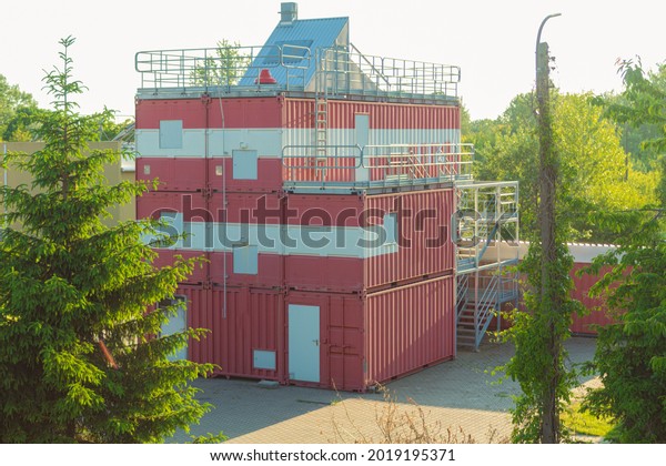 Observation tower made of metal\
construction containers. Premises for builders from metal\
containers