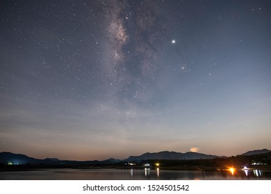 Observers at night have stars, milky way and galaxies filled the dark sky. - Shutterstock ID 1524501542