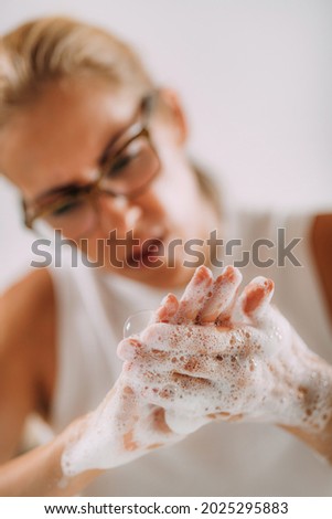 Obsessive compulsive disorder concept. Woman obsessively washing her hands.