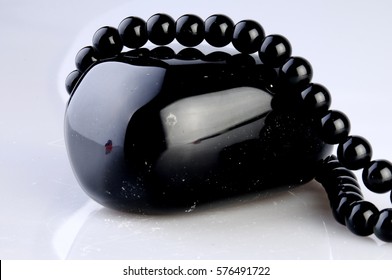 Obsidian Natural Stone - Shutterstock ID 576491722
