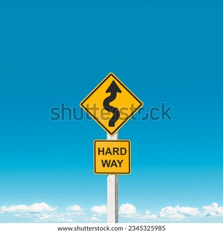 Obstacles await on the path ahead. Traffic sign warning winding curves against sky background. Striving in hard way for success. Challenging difficulty. Self-improvement motivation. Test of life.