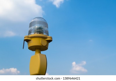 Obstruction Light On Roof Floor High Building For Airplane Safety With Blue Sky Background 