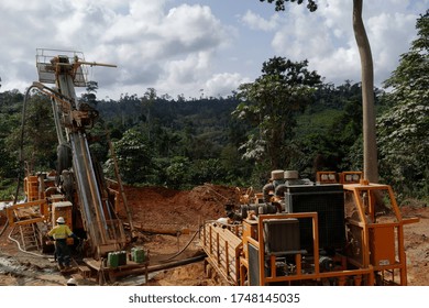 Obuasi, Ghana - September 16, 2017: Exploration Team And Drilling Unit Extracting Ore Samples To Determine If Gold Grade Is Acceptable For Industrial Production.