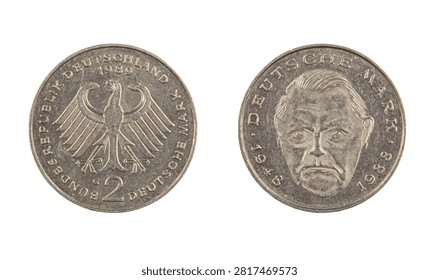 Obverse and reverse of a West German Deutsche Mark commemorative coin are shown. The coin features a design with the German eagle and a portrait. Focus is on the coin details.