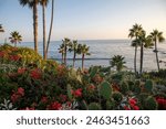 OC California, sunset, coastal, beauty, Pacific Ocean, beach, coastline, vibrant, colors, horizon, golden hour, ocean waves, breathtaking, scenic, coastline, palm trees, coastal cliffs, picturesque