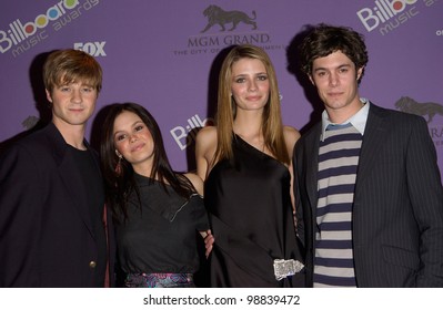 The O.C. Cast BENJAMIN McKENZIE (left), RACHEL BILSON, MISCHA BARTON & ADAM BRODY At The 2003 Billboard Music Awards At The MGM Grand, Las Vegas.  December 10, 2003  Paul Smith / Featureflash