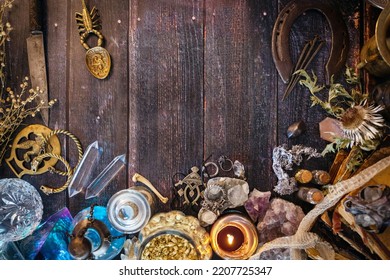 Occult Altar With Cristals, Snake Skin, Jewellery,potions, Herbs,  Bones And Old Books. Esoteric, Pagan, Wicca, Witchcraft Background With Magical Objects. Halloween Concept. Top View, Copy Space.