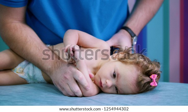An occupation with baby with cerebral\
palsy. Physiotherapy