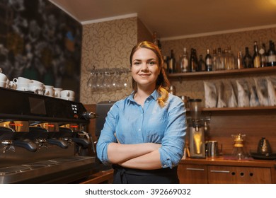 occupation, profession, job, small business and people concept - happy barista woman at coffee shop
