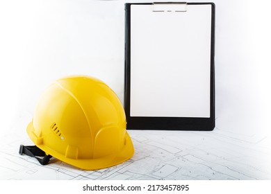 Occupational Safety In Construction, Health Protection, Hard Hat With Sheet For Text In Clipboard