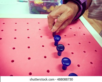 Occupational Therapy - Exercising With Peg Board. Hand Function Training For Stroke Patient.