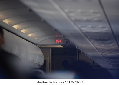 Occupied toilet sign in a plane during a flight.  - Shutterstock ID 1417573937
