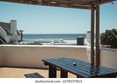 Ocean background, tropical beach of Paternoster in South Africa with a breathtaking view from a roof terrace. White houses against azure blue sea waters in the Western Cape during summer. - Powered by Shutterstock