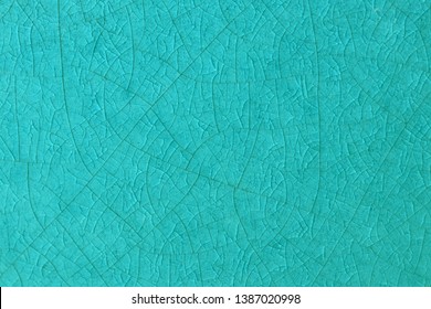 Ocean Blue Crack Ceramic Tile. Sea Color Of Glazed Tile Texture Abstract Background. Texture Of Turquoise Crackle Glass Mosaic Tile.