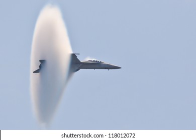 OCEAN CITY - JUNE 14:F-18 Super Hornet Travels Subsonic Speed With Visible Vapor Cone On June 14, 2012 In Ocean City, Maryland. Vapor Cone Is Also Called Sonic Boom And Is A Very Rare Observed