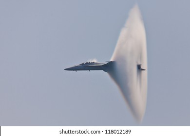 OCEAN CITY - JUNE 14:F-18 Super Hornet Travels Subsonic Speed With Visible Vapor Cone On June 14, 2012 In Ocean City, Maryland. Vapor Cone Is Also Called Sonic Boom And Is A Very Rare Observed