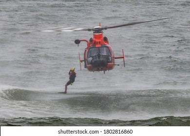 Ocean City, Maryland / USA - Aug 15, 2020:  A US Coast Guard Rescue Swimmer Performs A Rescue/recovery Demo