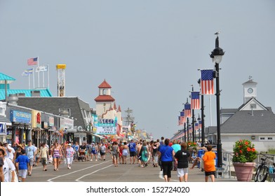 OCEAN CITY, NEW JERSEY - SEPTEMBER 1: Ocean City Boardwalk in New Jersey, as seen on September 1, 2013. The boardwalk is 2.5 miles long and one of the most well-known boardwalks in the world.
