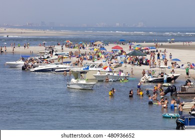 Ocean City, New Jersey, USA - July 24, 2016: Summer Vacationers Enjoying A Day At The Beach And Ocean At Corson's Inlet Located Between Ocean City And Strathmere, New Jersey On July 24, 2016