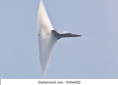 OCEAN CITY, USA - JUNE 12:F-18 Super Hornet Travels Subsonic Speed With Visible Vapor Cone On June 12, 2011 In Ocean City, MD, USA. Vapor Cone Is Also Called Sonic Boom And Is A Very Rare Observed