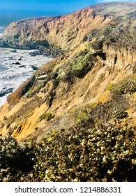 Ocean Cliffs Overlooking Shore Beach on Sunny Summer Day