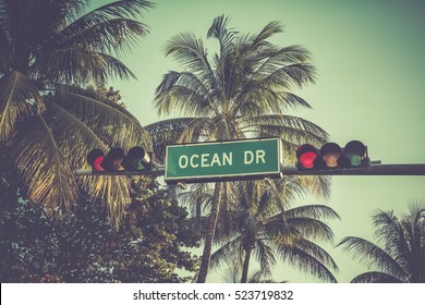 Ocean Drive Sign With Palm Trees In Miami Beach, Florida. Vintage Style Colors.