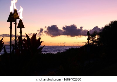 Ocean Front Tiki Torches at Dusk in Kauai Hawaii