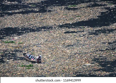 The Ocean Of Garbage In The River Banks. People Collecting Plastic Garbage In The One Of Polluted River In Indonesia, Citarum River, West Java Province (2019).