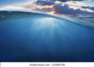 Ocean Half Water With Sunset Sky