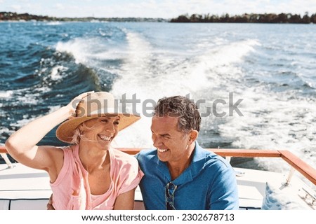 Ocean, happy couple and on a boat for retirement travel, summer freedom and holiday in Bali. Smile, love and a senior man and woman on a yacht for vacation adventure, luxury and a cruise date