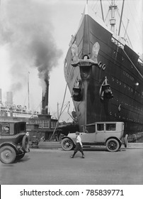 The ocean liner 'Leviathan' at a New York City pier, c. 1920s. She was originally the German flag passenger liner 'Vaterland', but was seized as a troop transport from April 1917-1919. She remained in