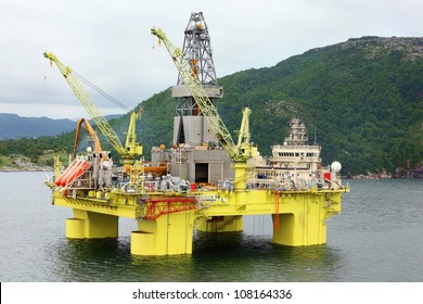 Ocean Offshore Oil Rig Drilling Platform Off Near Wooded Shore Of Stavanger, Norway.