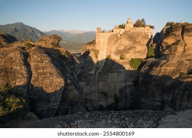 Ocean rocky cliffs sunset Greece Meteory. High quality photo - Powered by Shutterstock