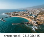 ocean shore with hotels and beach, Los Cristianos, Tenerife, Canary, aerial shot