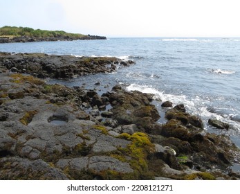 Ocean View Of A Black Rock Beach