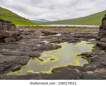 Ocean View Of Lake Sørvágsvatn Also Known As Lake Leitisvatn. The Island Of Vágar. Faroe Islands