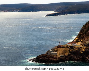 ocean view with lighthouse on rocks