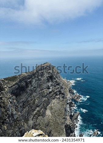 Similar – Image, Stock Photo Green rocky coast at a calm sea in northern Spain