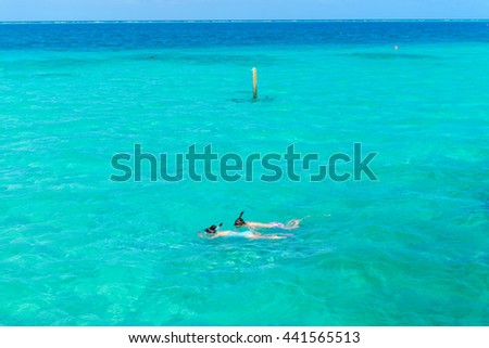 ocean villas in Maldives ,beach background for summer travel with sun ,norkeling in the blue sea Stok fotoğraf © 
