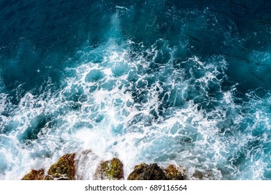 Ocean Water With Waves And Seafoam.