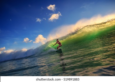 Ocean Wave Surfing Girl