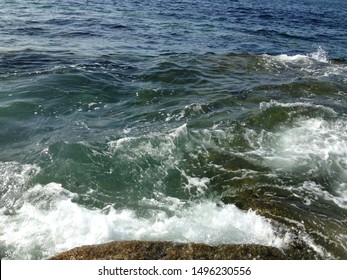 Ocean Waves In The Atlantic Ocean Off The Coast Of Rockport, Massachusetts At Halibut Point State Park.