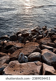 The Ocean waves hitting the rocks